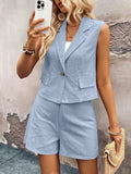 Light blue sleeveless one-button vest top and matching shorts set with patch pockets