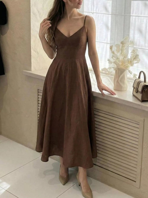Cedar & Moore brown A-line spaghetti strap midi dress made of polyester with a V-neckline and flowing skirt.