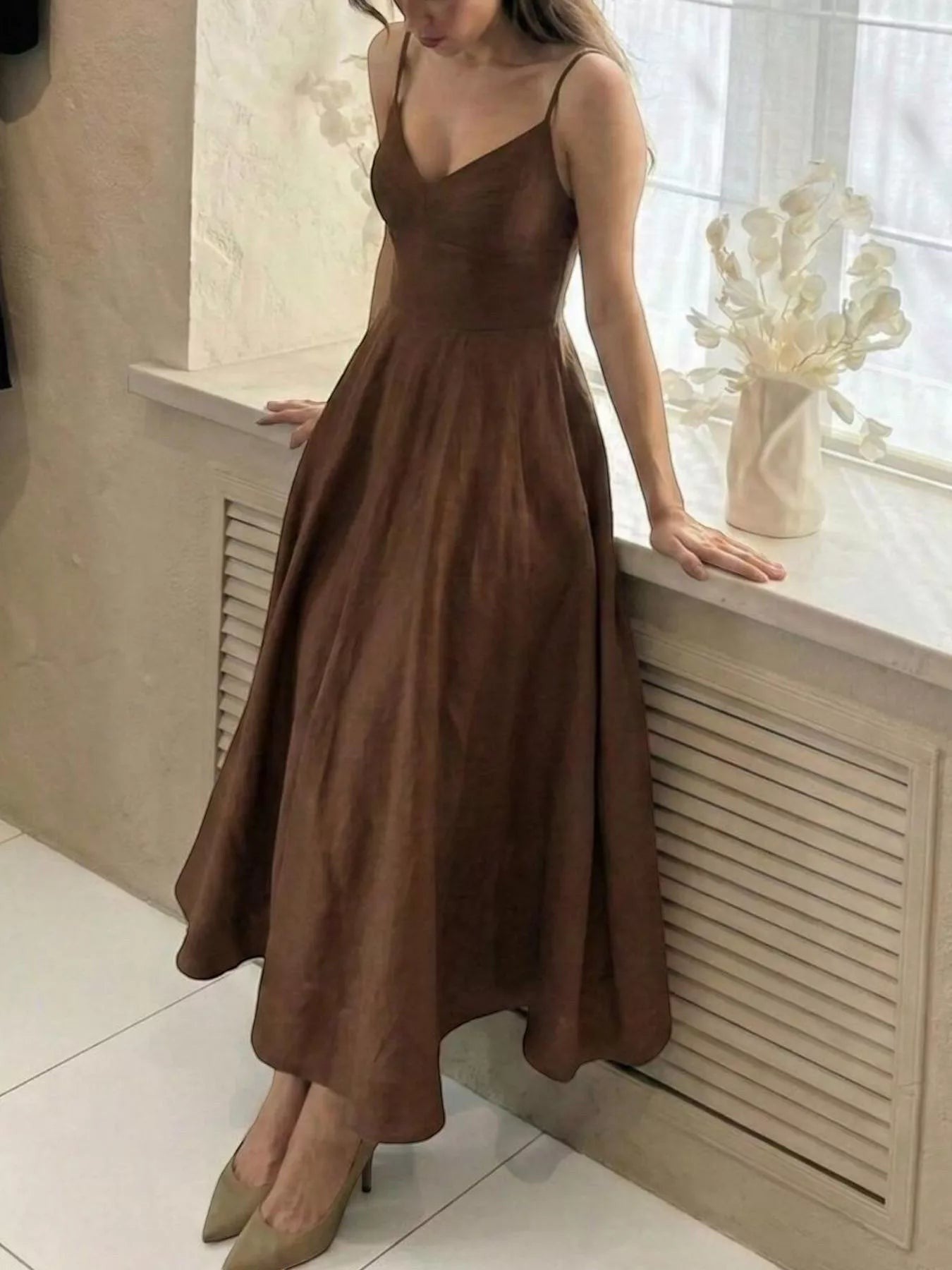Cedar & Moore A-line spaghetti strap midi dress in brown polyester. Flattering V-neck and flowing skirt.