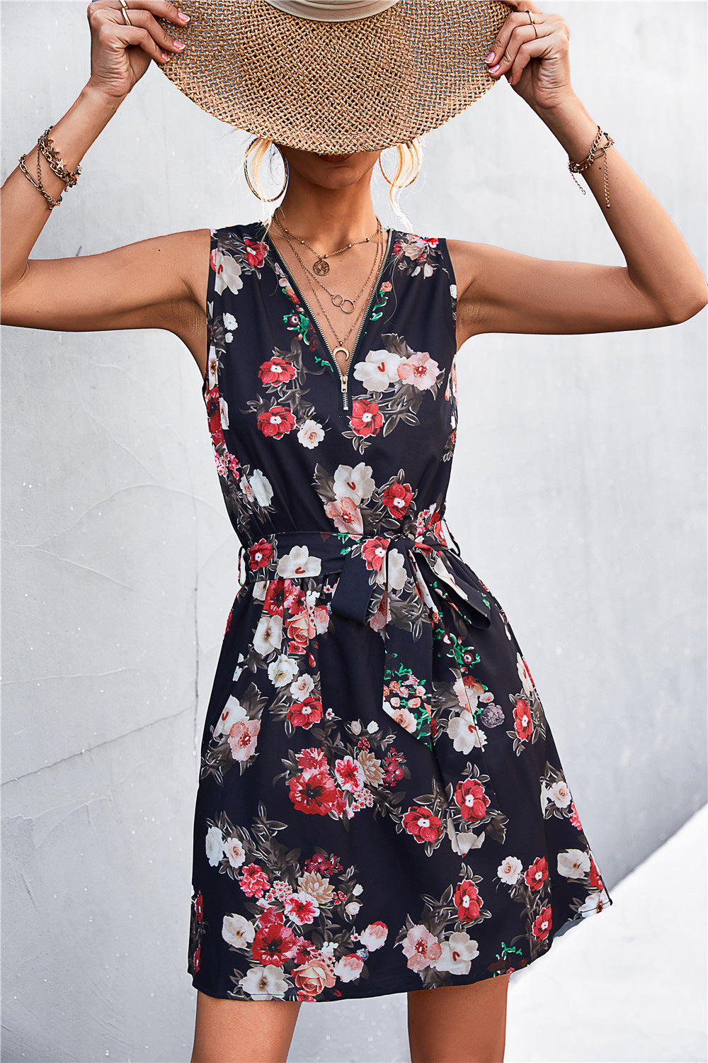 Dark floral sleeveless dress with V-neck and gathered tie waist, sleeveless