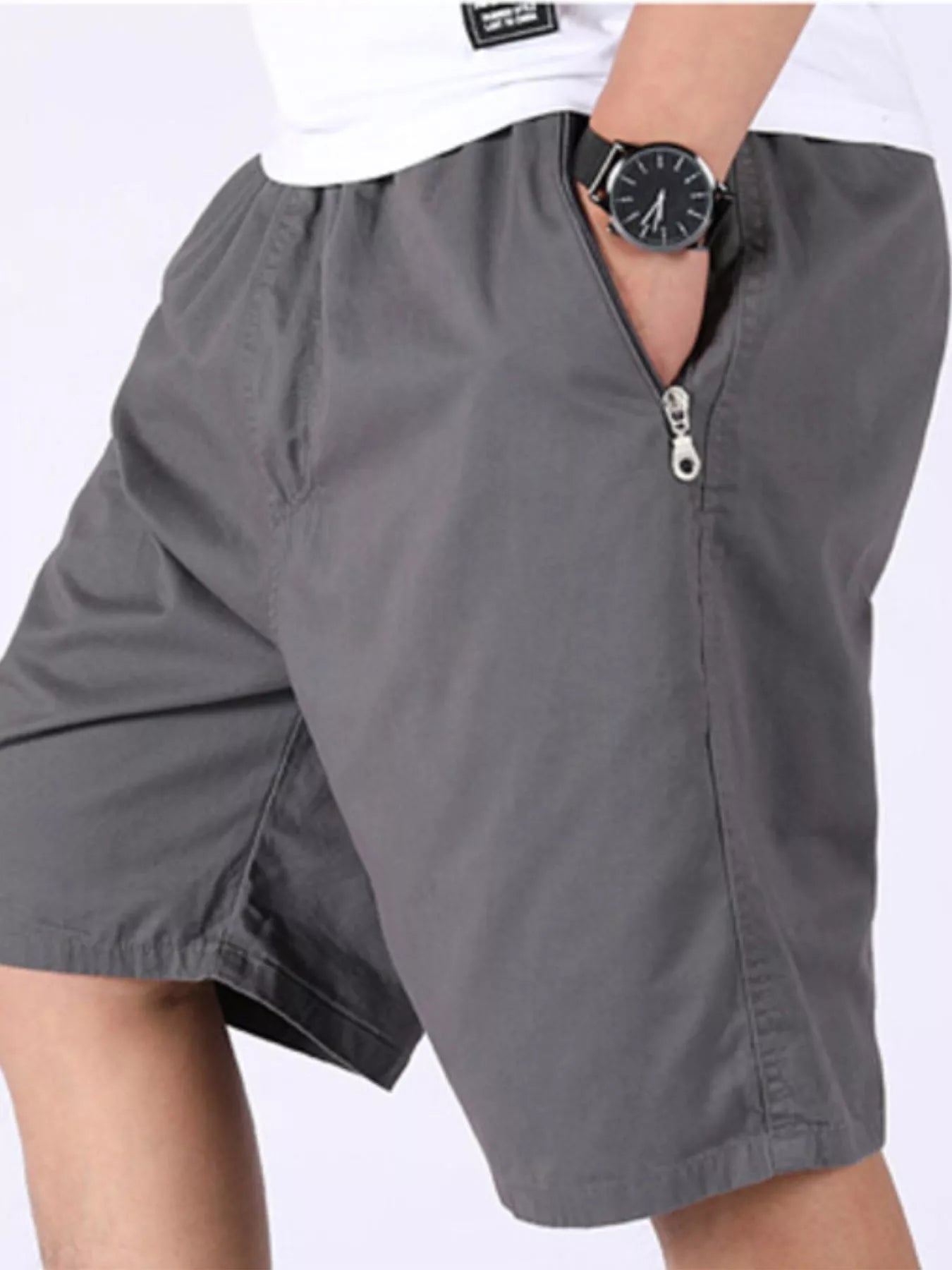 Dark grey cargo shorts with front zip fly and cargo pocket detail.
