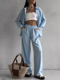 Light blue relaxed-fit shirt and wide-leg pants set, button front and elastic waist
