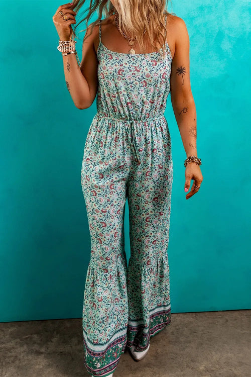 Teal floral spaghetti-strap jumpsuit with gathered waist and wide flares