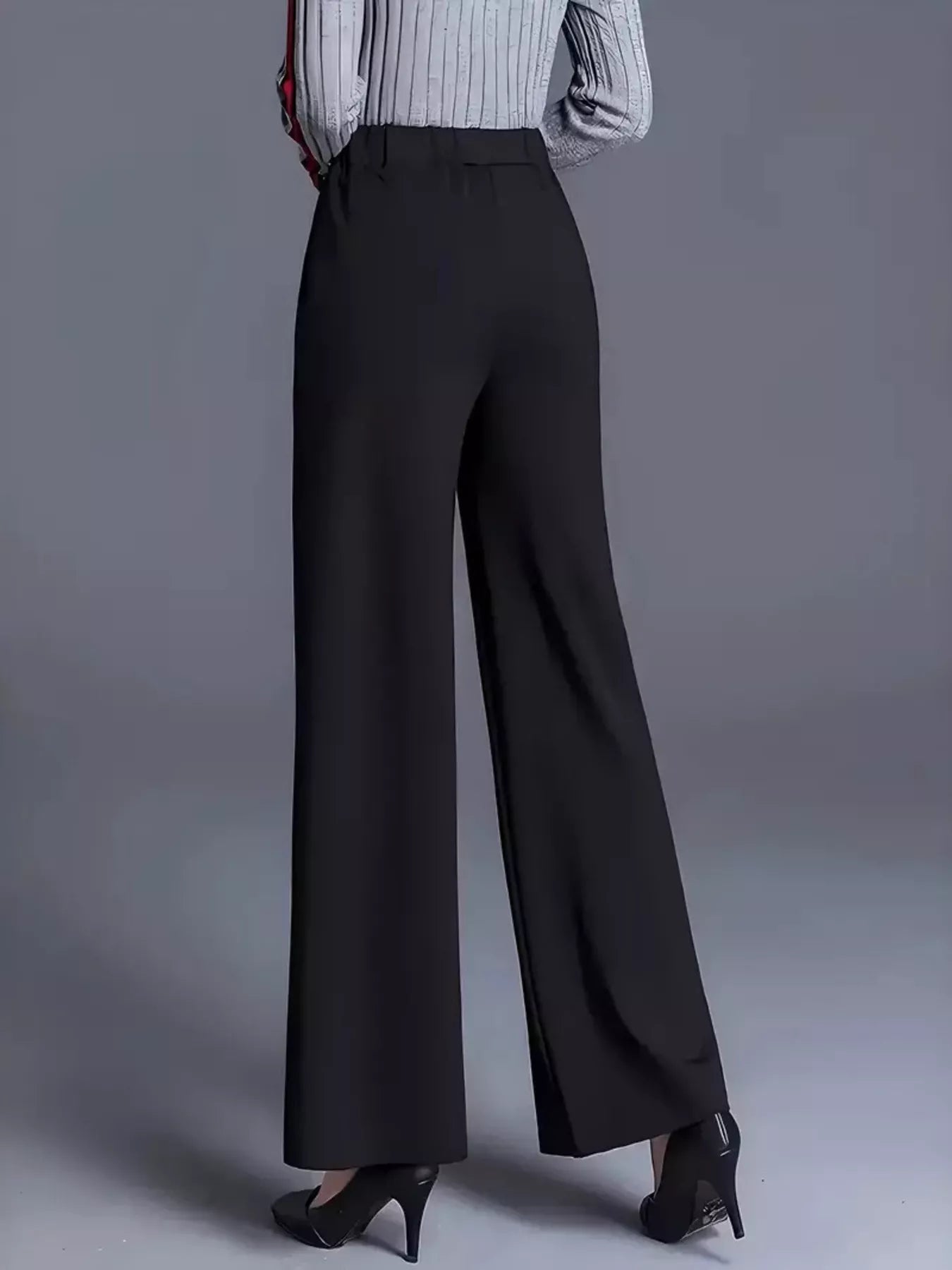 High-waisted wide-leg pants in black, full-length wide legs with smooth front and structured waist