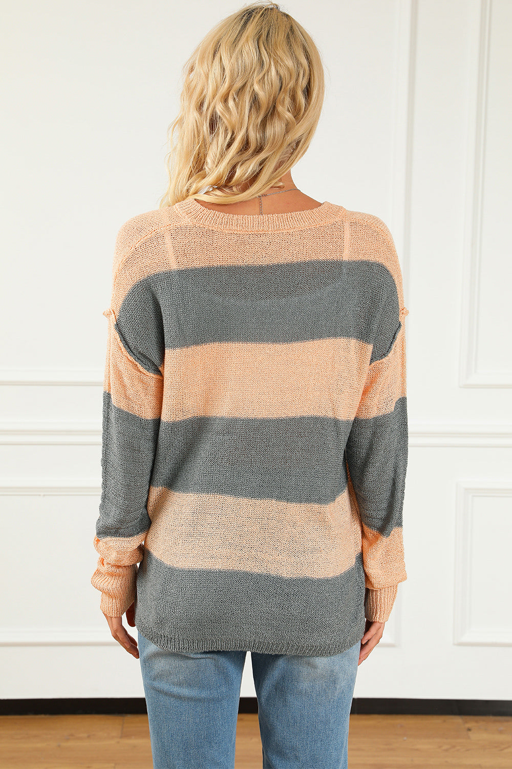 Striped button-front sweater, camel and dark gray, long sleeves, back view