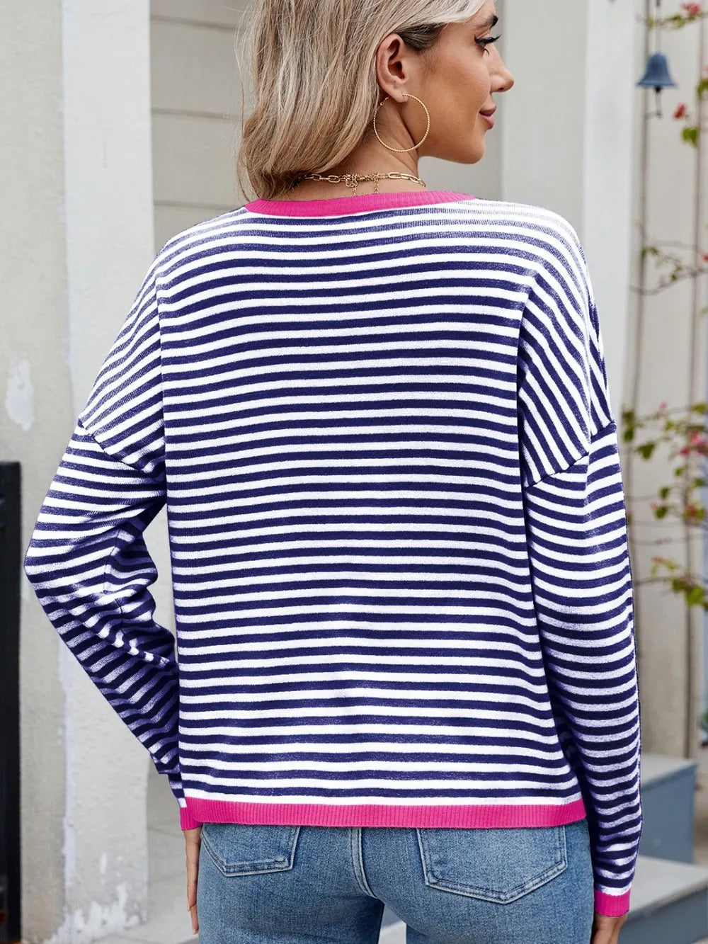 Striped contrast round-neck long-sleeve sweater, back view, navy and white stripes with pink trim