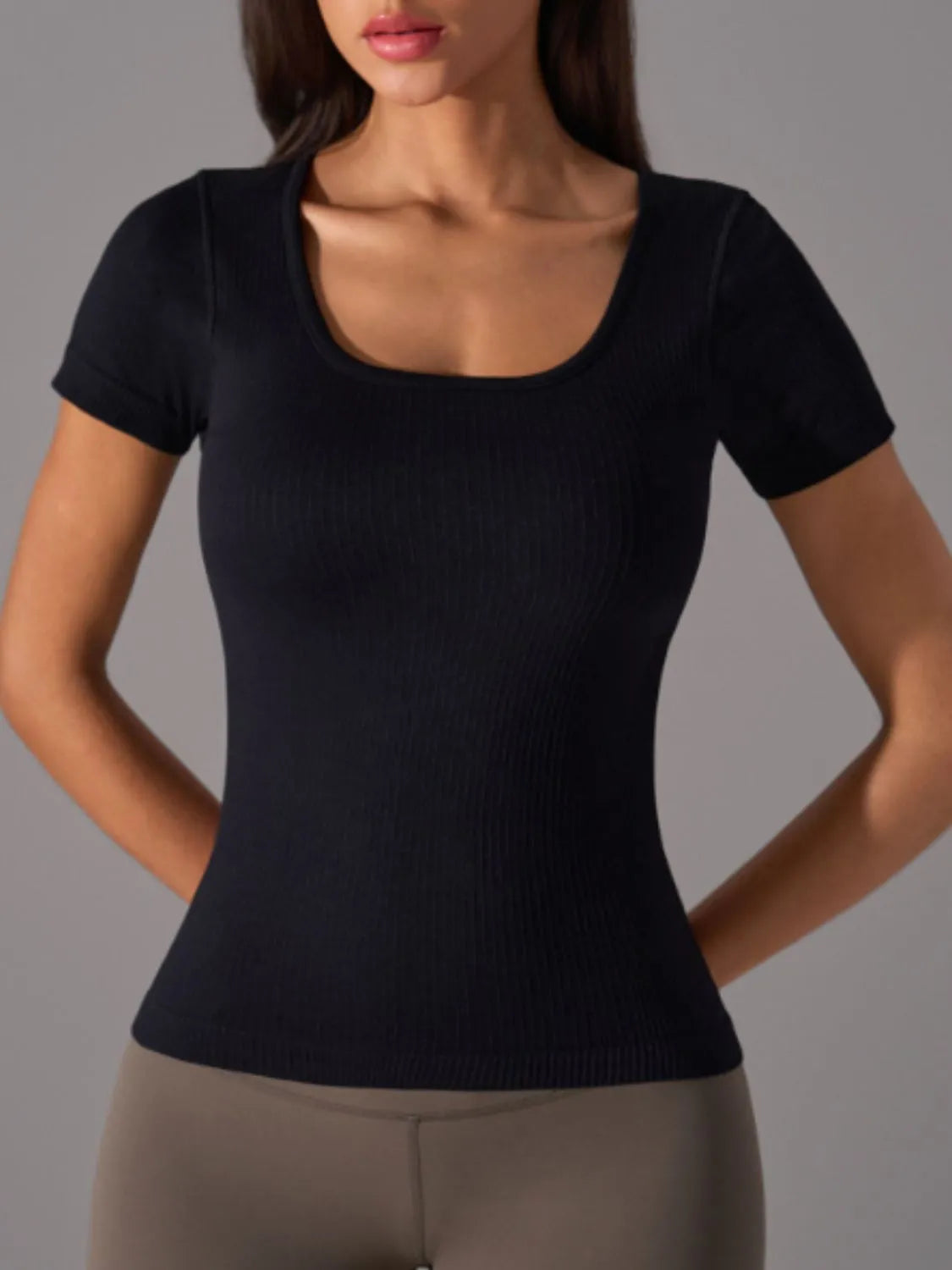 Black square-neck active t-shirt with ribbed knit and fitted waist