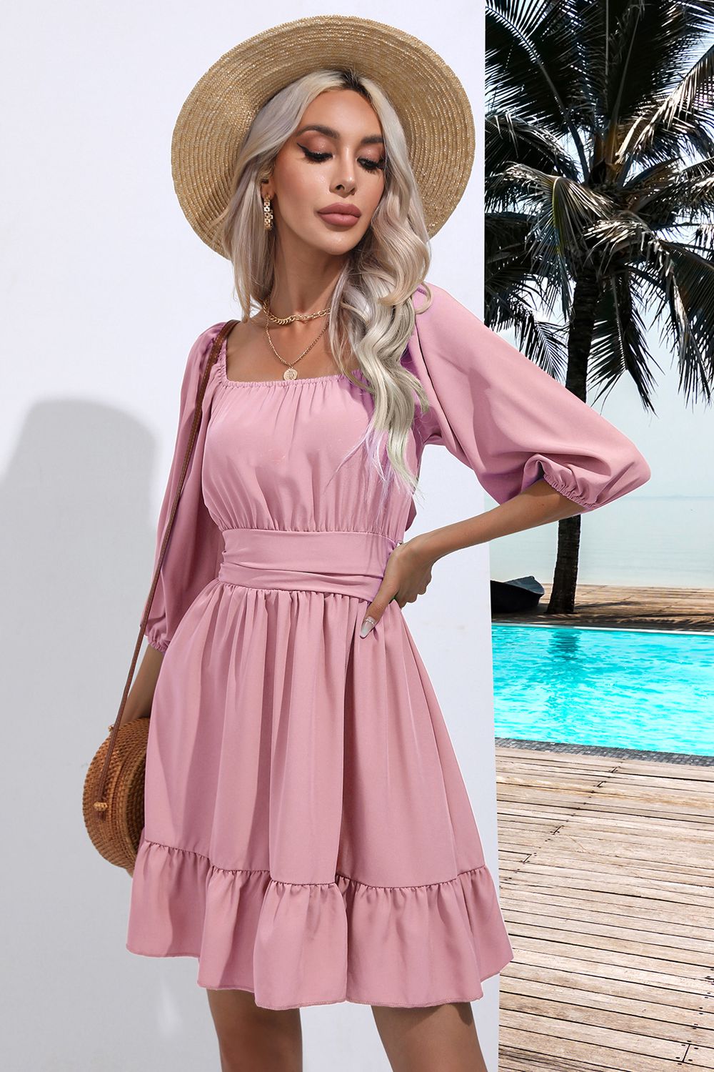 Blush pink square-neck ruffle hem dress with tie-back detail and puff sleeves