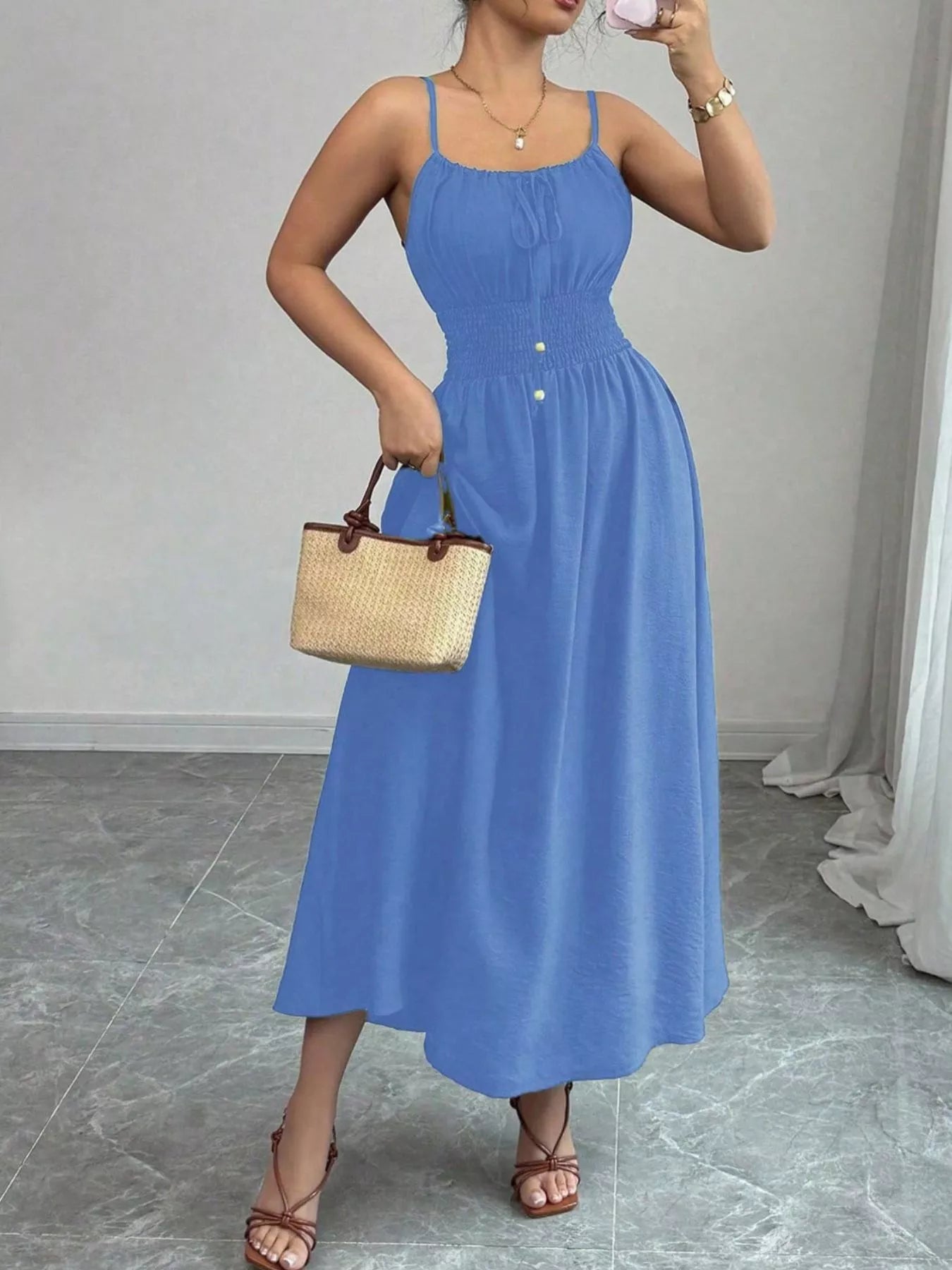 Smocked midi dress with spaghetti straps in blue, buttoned smocked bodice and full skirt