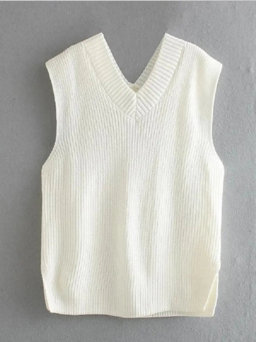 Cream ribbed V-neck sleeveless sweater vest with sleeveless knit body