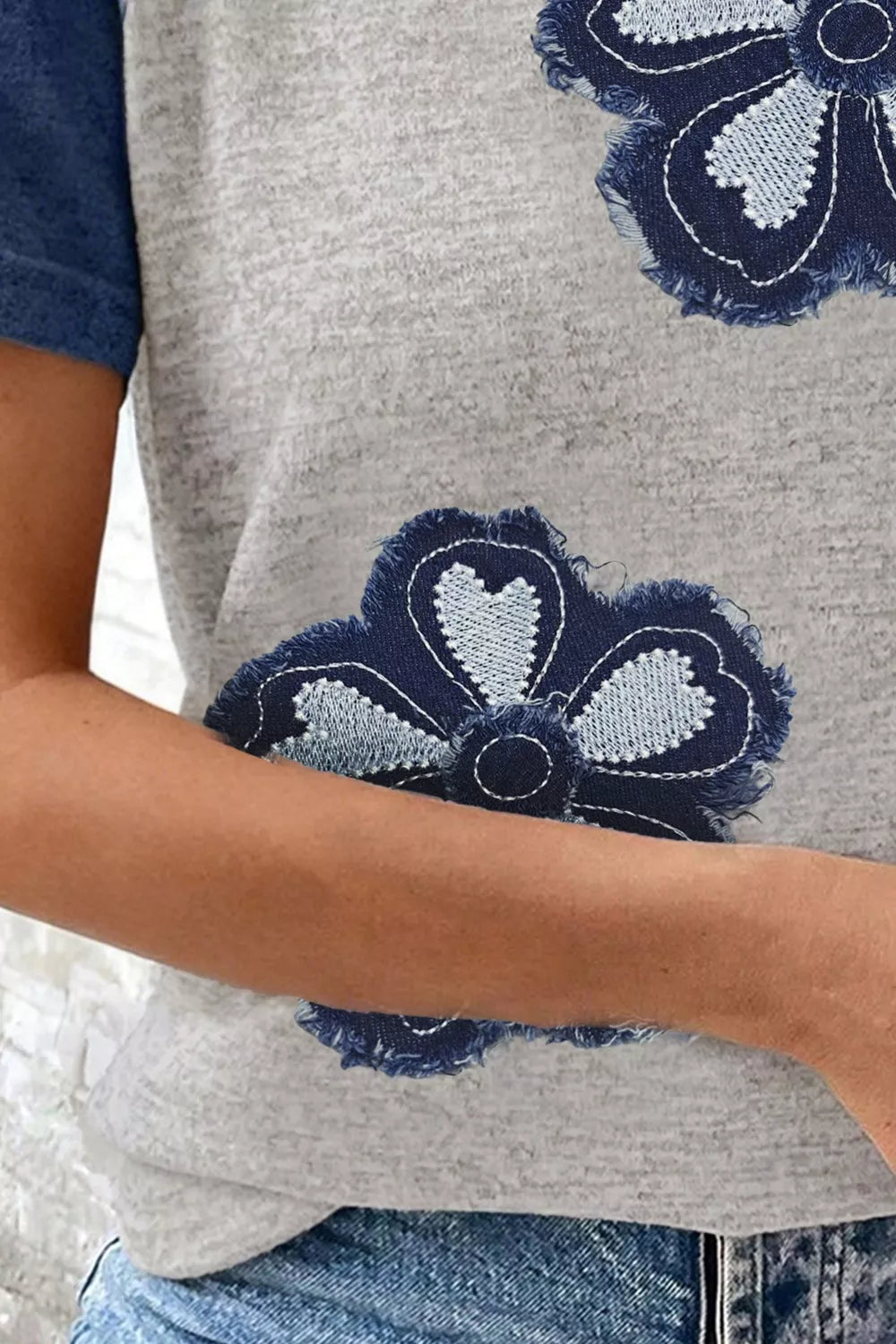 Cedar & Moore Floral Raglan Sleeve T-Shirt with two denim flower patches on gray heather fabric; Trendsi.
