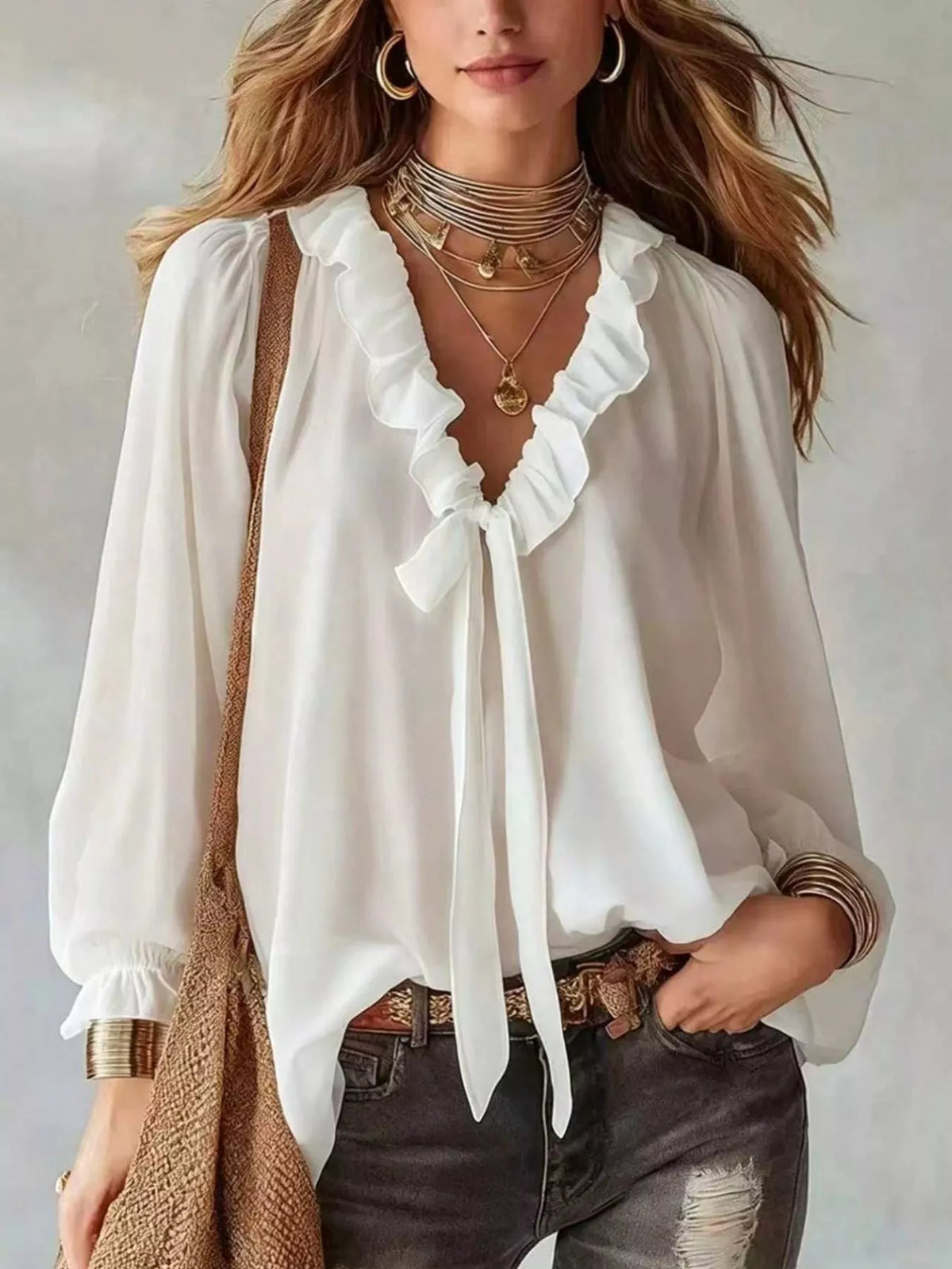 White ruffle V-neck front-tie blouse top with long sleeves and gathered trim