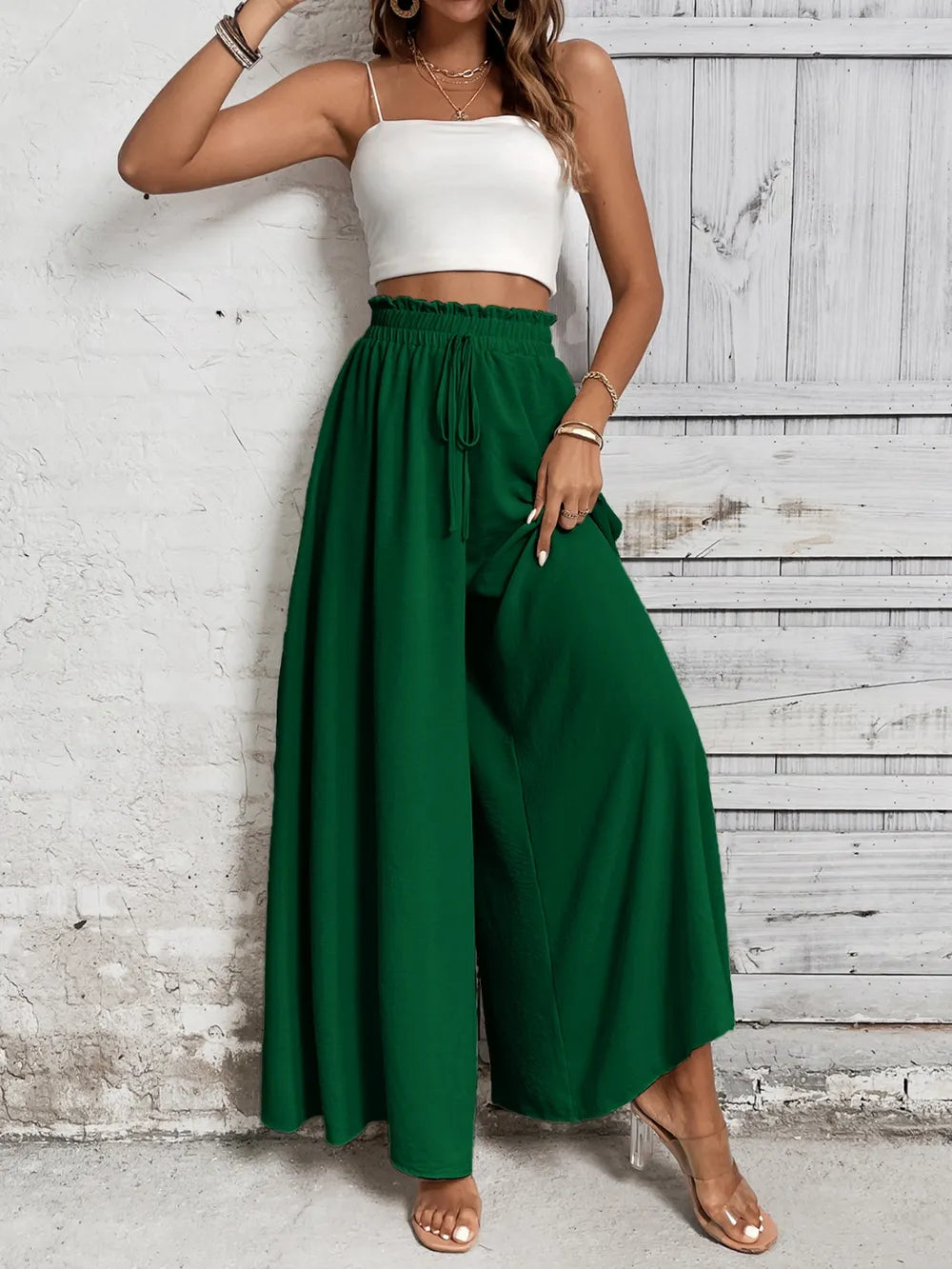 High-waist wide-leg pants in dark green with elastic waist and drawstring tie