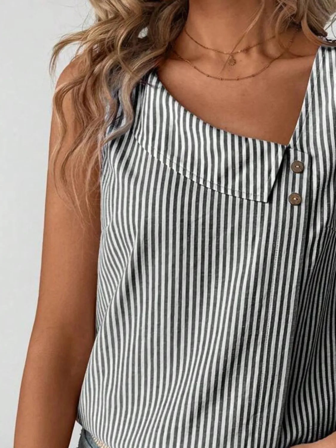 Light blue and white striped tank top with structured yoke and wooden-look center buttons