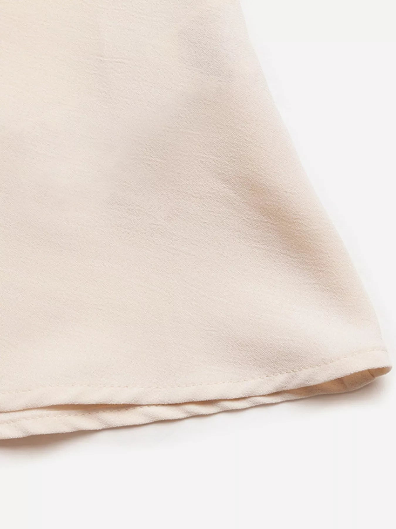 Cedar & Moore sleeveless A-line midi dress in beige fabric with soft textured finish