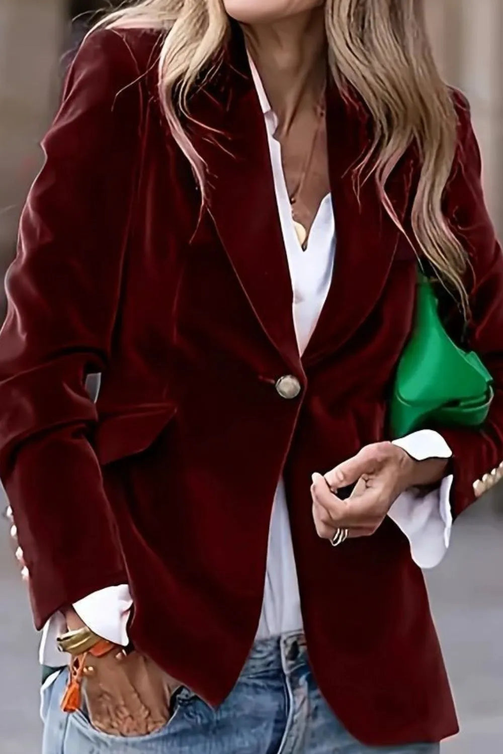 Burgundy one-button lapel blazer with long sleeves, notched collar, and front button.
