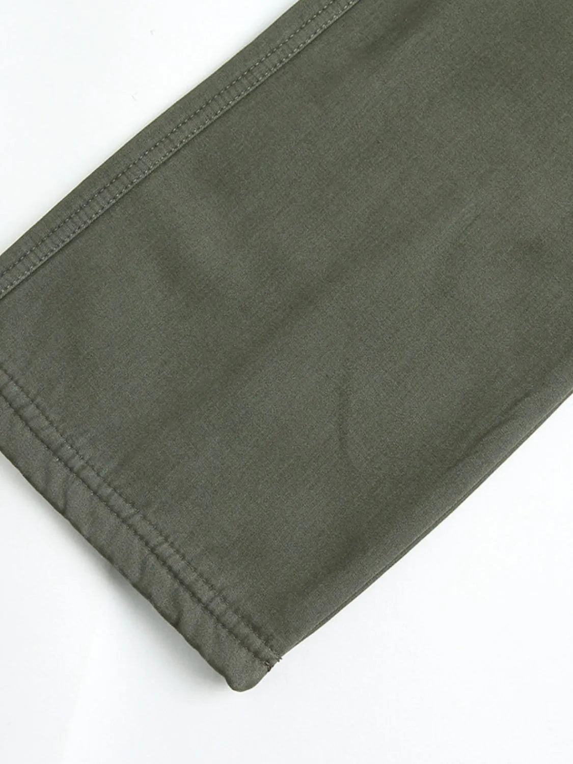 Men's solid cargo pants in olive green with clean hem and straight leg opening