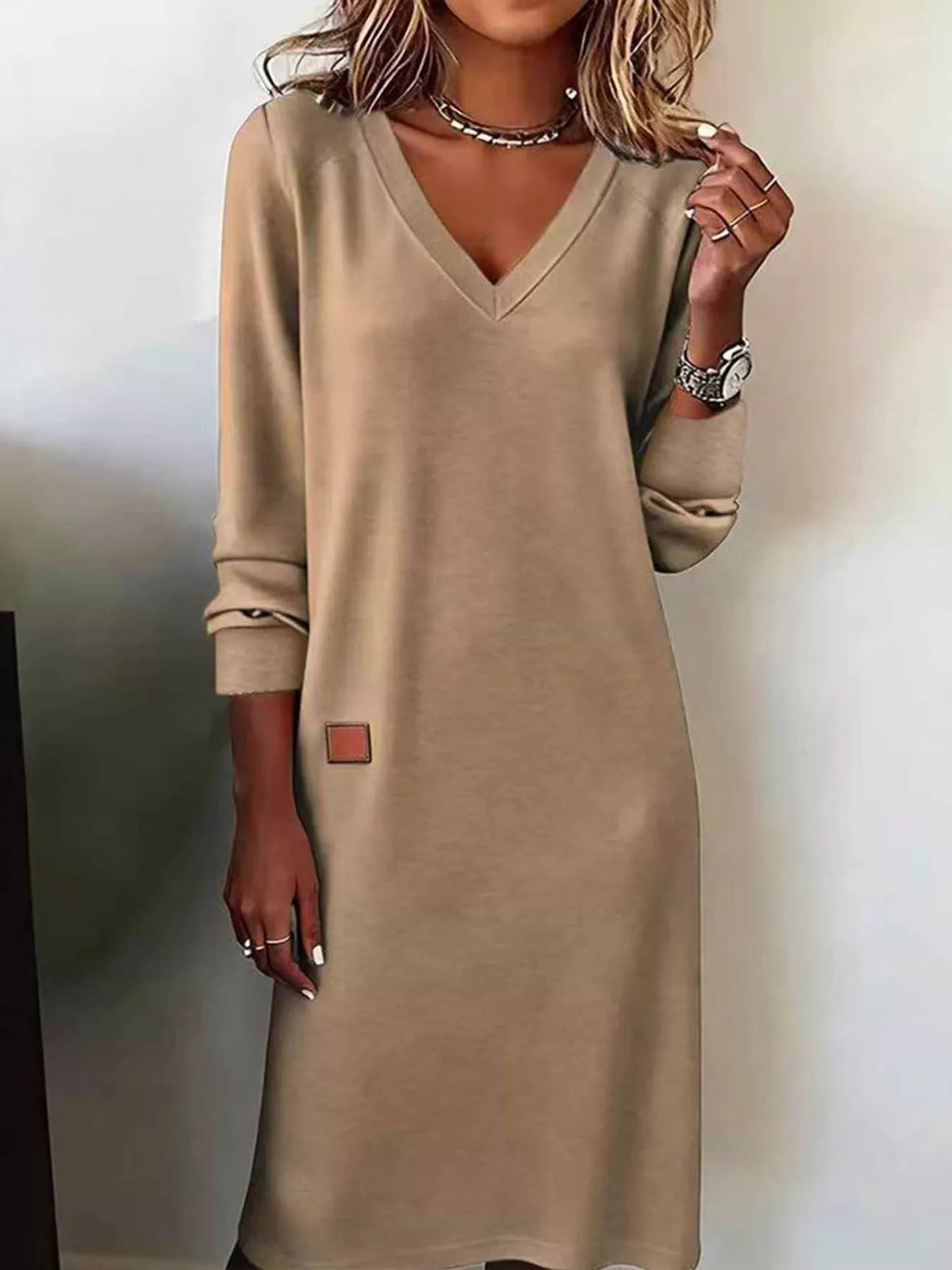 V-neck long-sleeve midi dress in light khaki-beige, with cuffed sleeves and small patch tag