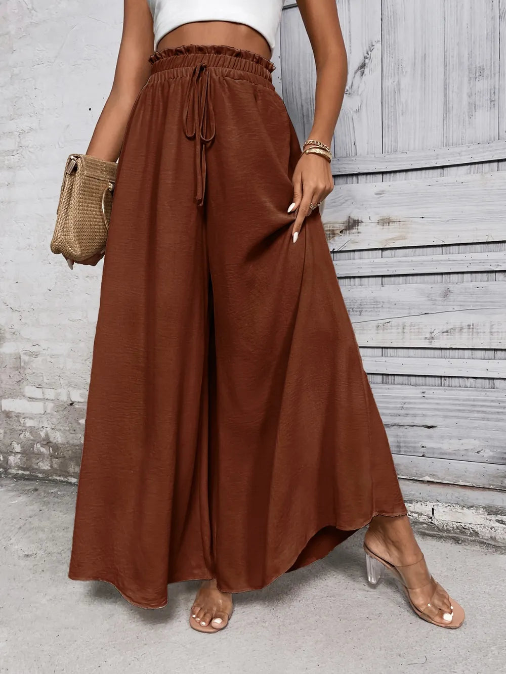 High-waist wide-leg pants in dark brown with elastic waistband and drawstring tie
