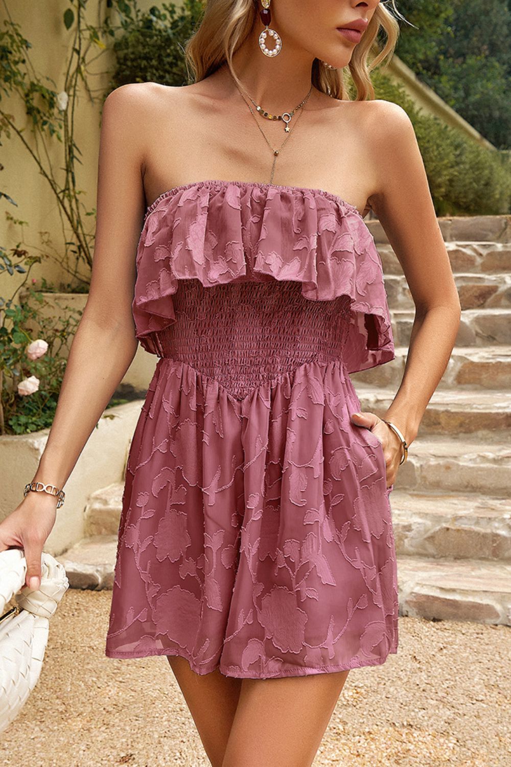 Mauve pink strapless layered smocked romper with ruffle top and short skirt