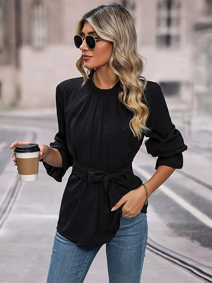 Black tie-waist blouse with gathered neckline and loose long sleeves
