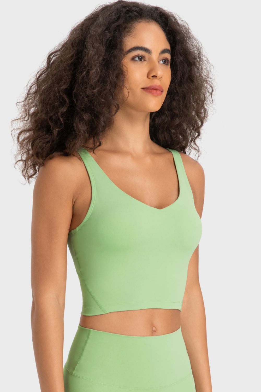 Deep V-neck crop sports bra, green V-neck with racerback straps