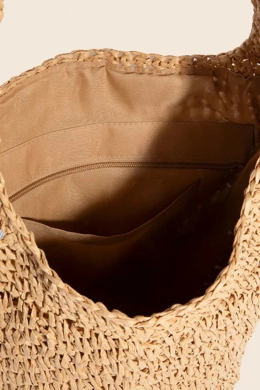 Open braided hobo shoulder bag interior with tan lining and woven edge