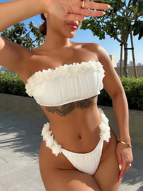 White ruffle bandeau bikini top with tie-back straps and matching high-cut bottoms