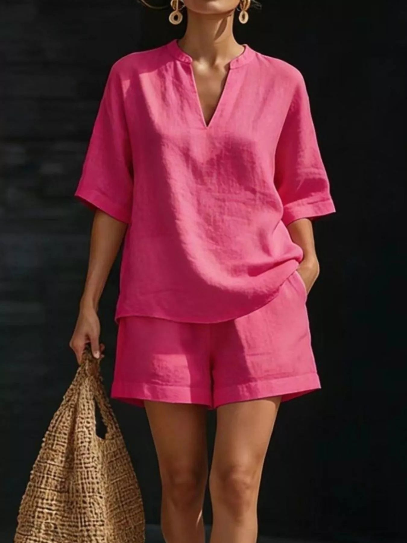 Plus size fuchsia pink half-sleeve V-neck top and matching short shorts set