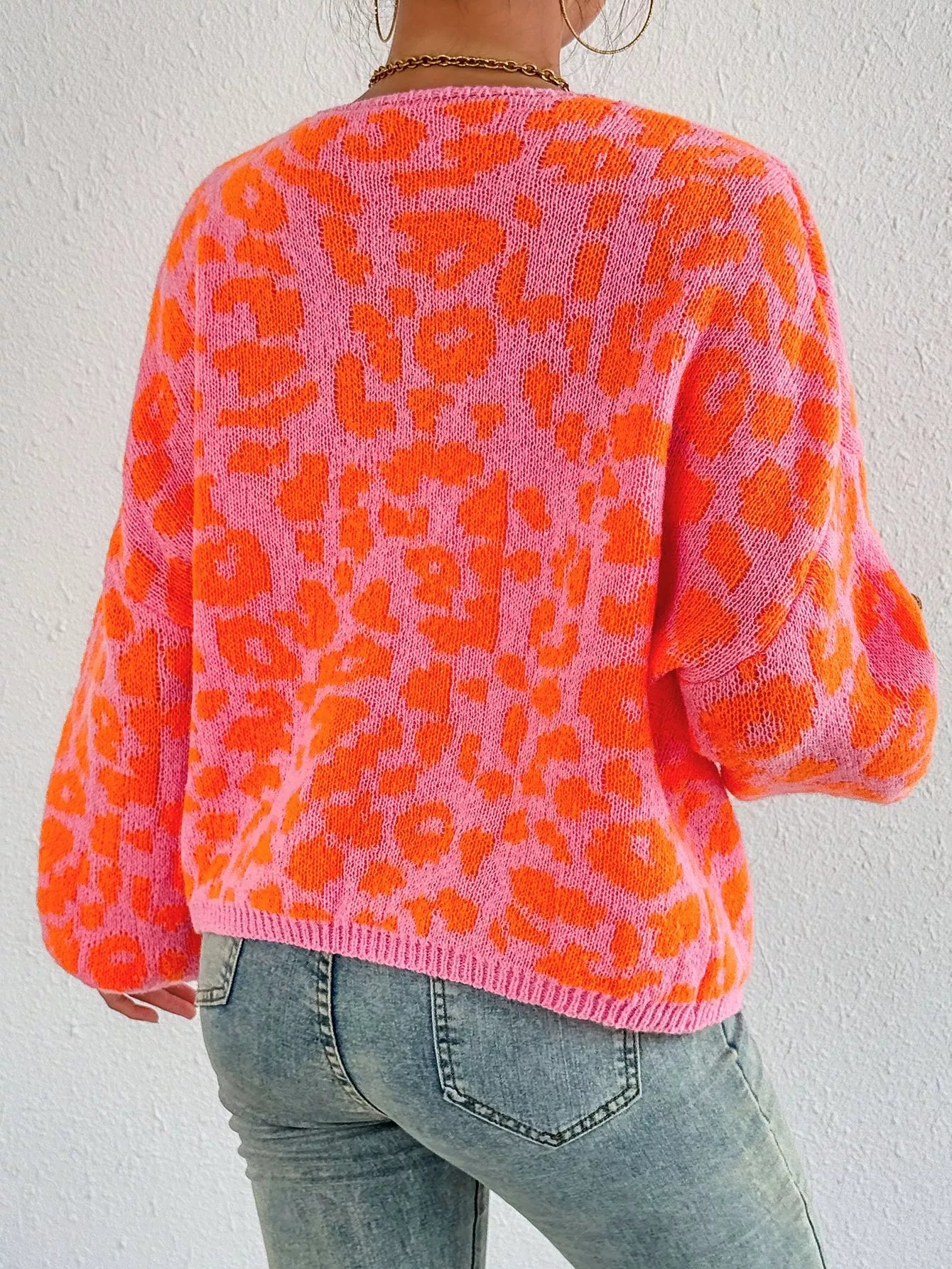 Leopard tie-front cardigan, orange knit back view with allover leopard print