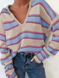 Beige V-neck striped sweater with long sleeves and collar