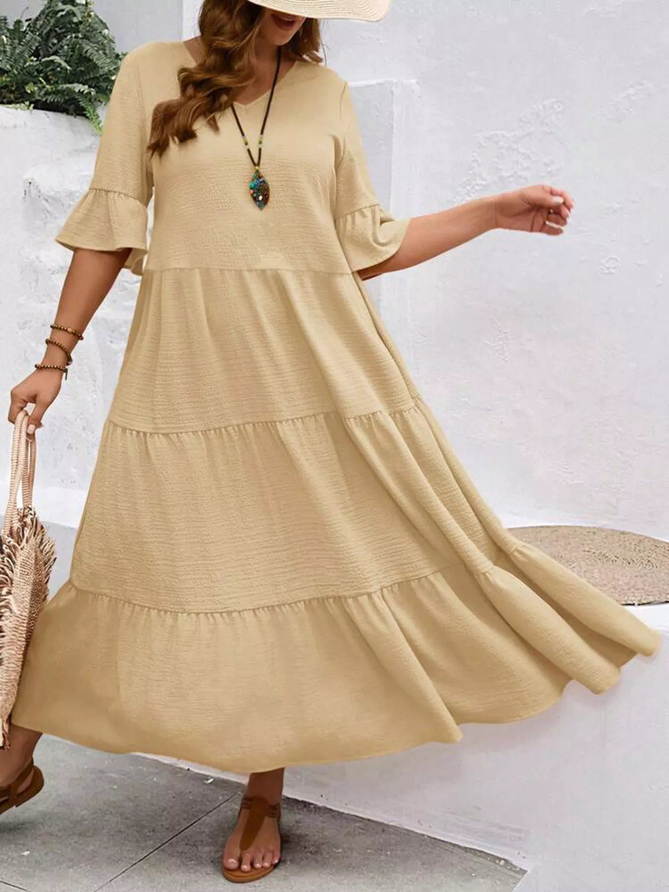 Apricot tiered midi dress with ruffle sleeves, tiered hem and V-neckline