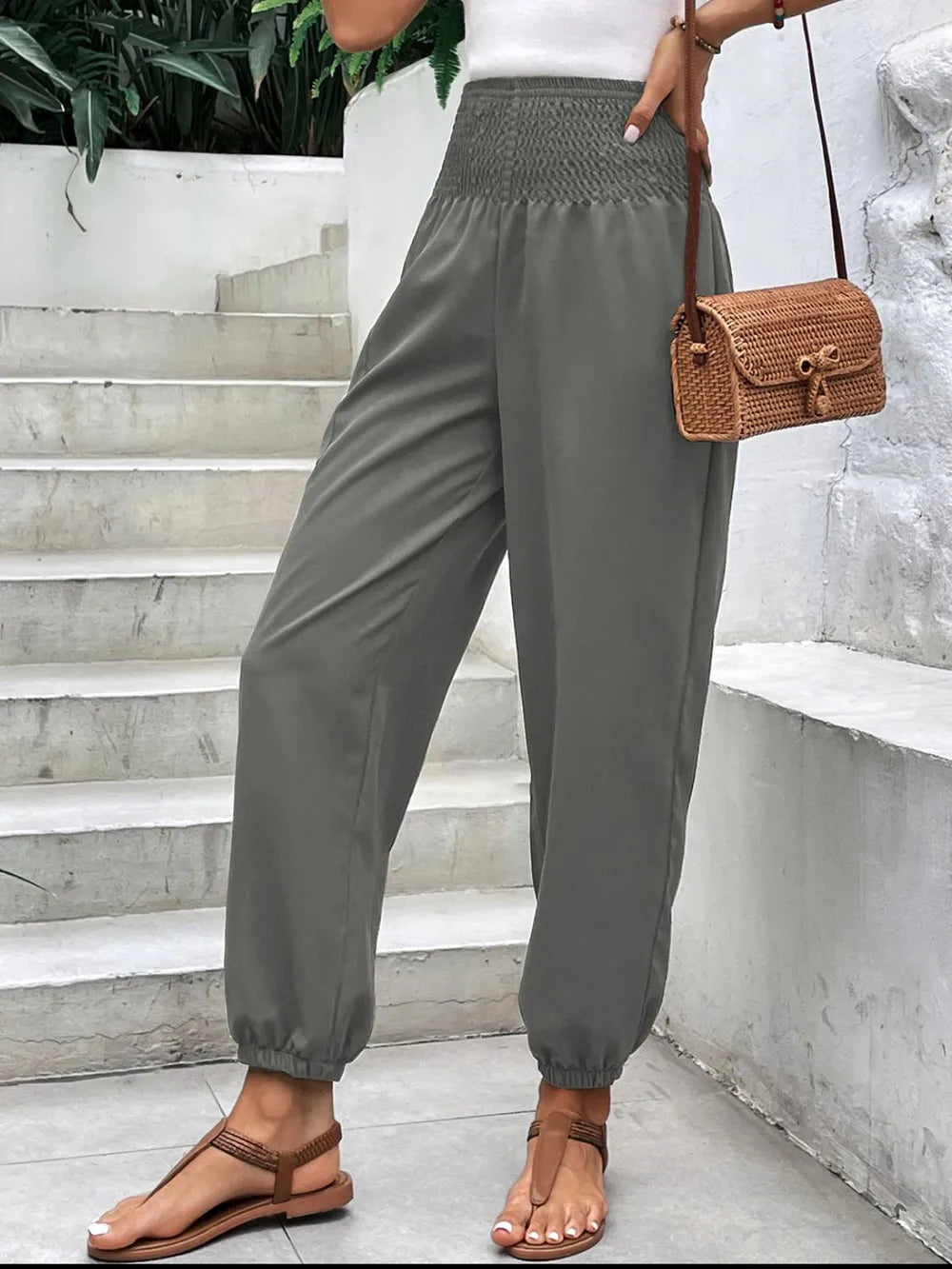 Smocked high-rise joggers with side pockets, gray relaxed ankle fit