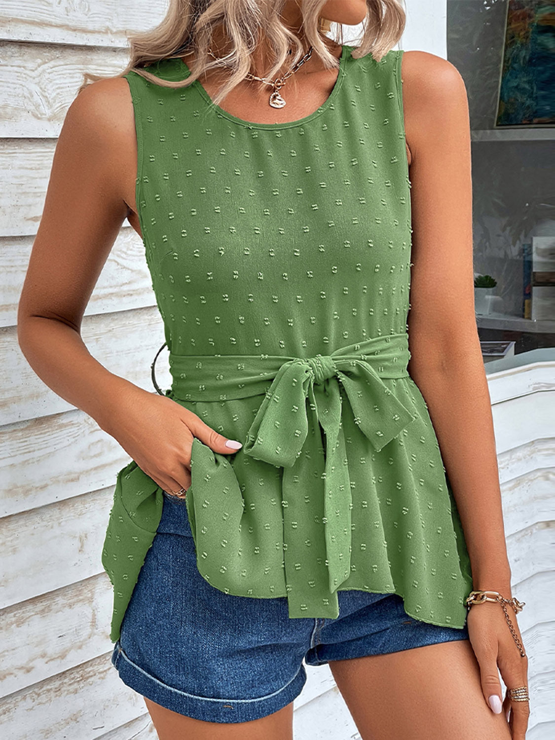 Mid green swiss dot tie-waist tank top with gathered peplum and belt tie