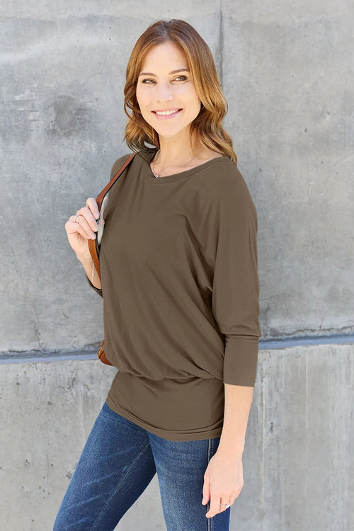 Dark brown round-neck batwing sleeve top, knotted front hem