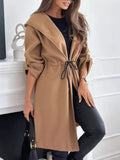 Light brown hooded jacket with front closure and black drawstring waist, side pockets