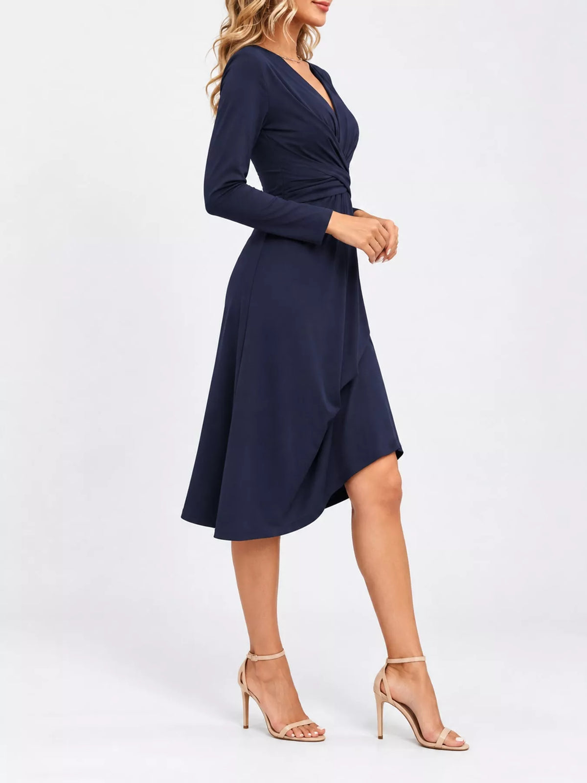 Navy blue long-sleeve midi dress with ruched front and crisscross elastic waist.