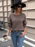 Coffee brown cutout round-neck long-sleeve sweater with ribbed cuffs and hem