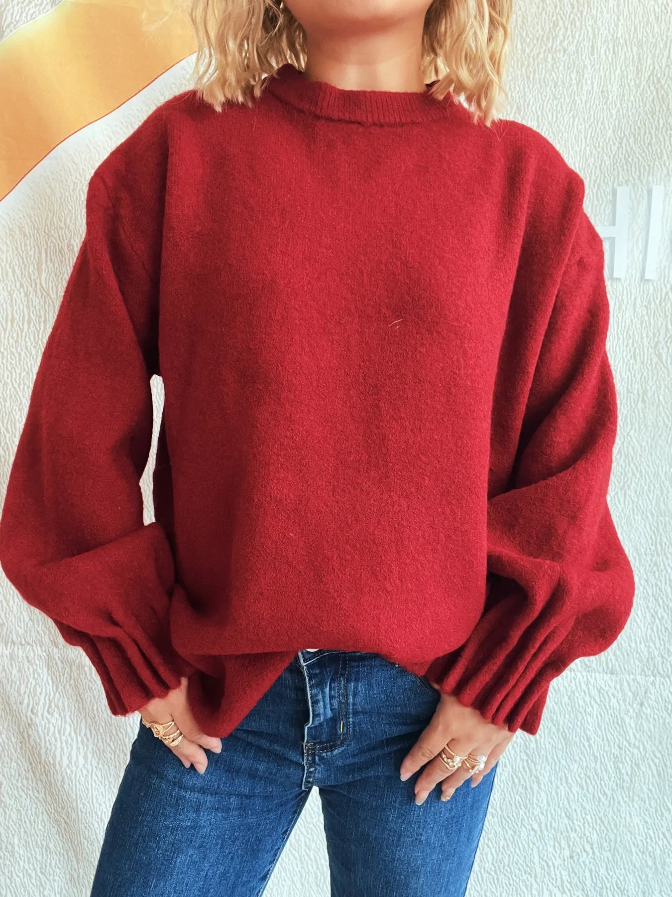 Red round neck dropped-shoulder sweater with ribbed cuffs and relaxed fit