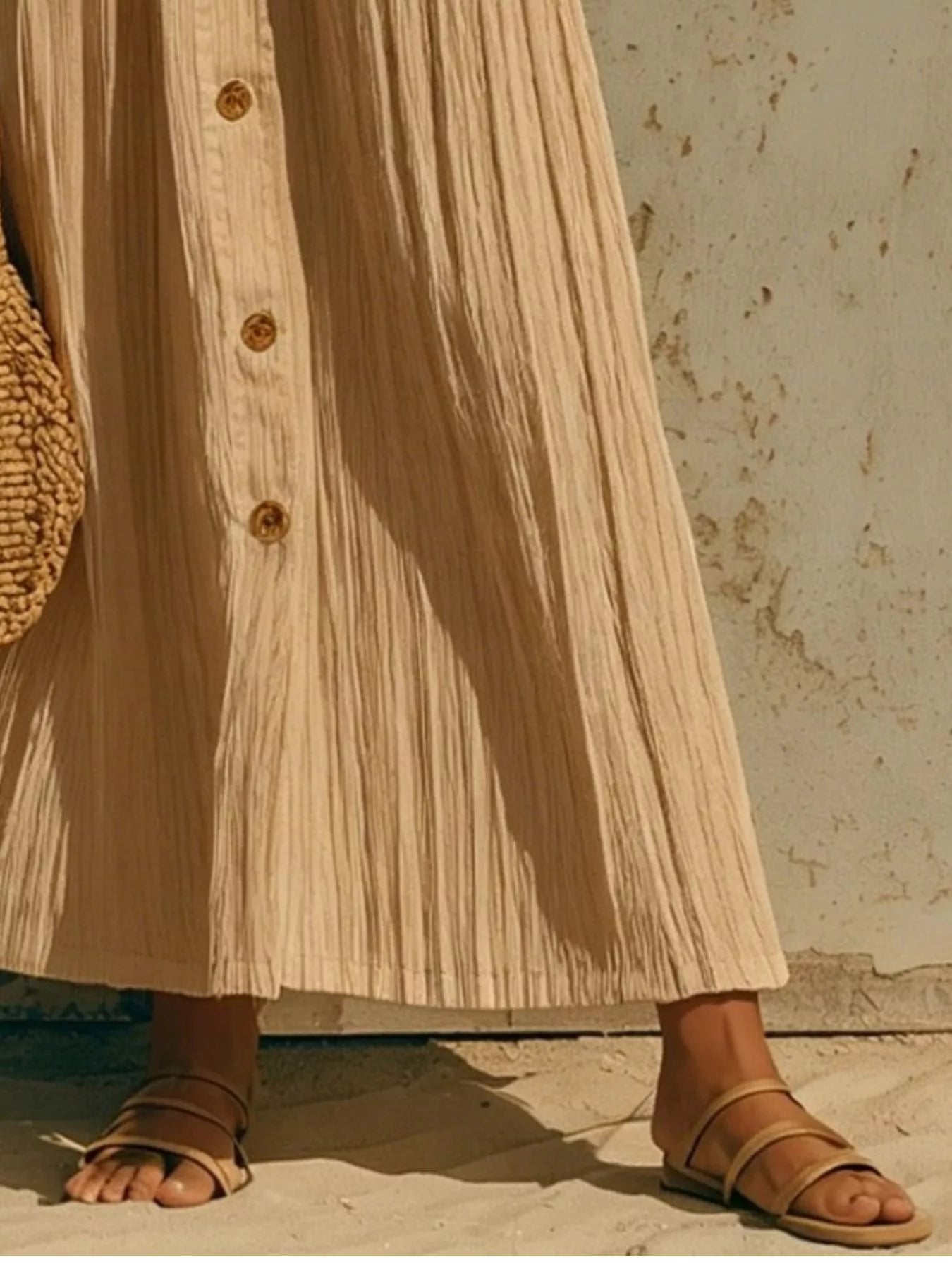 Khaki textured long maxi skirt with gold buttons and pleated, gathered panels
