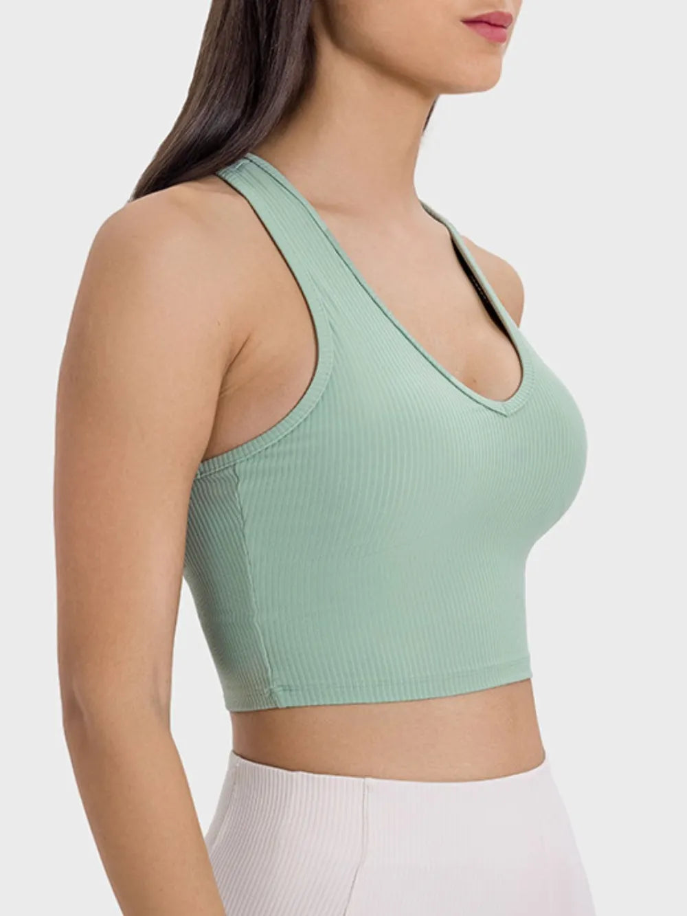 Mint green active tank with scoop neck and wide straps, cropped length