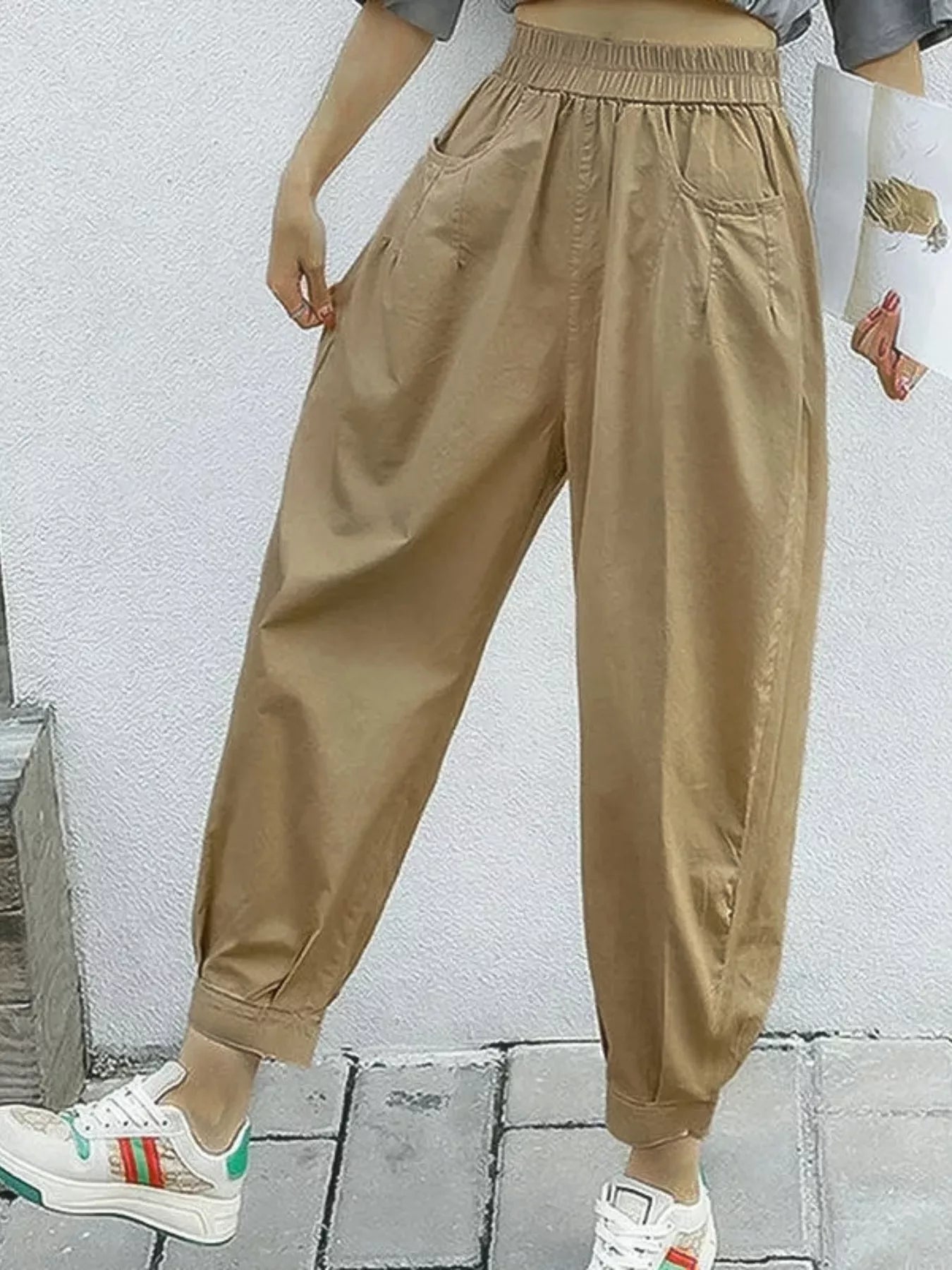 Khaki loose-fit harem pants with elastic waist and side pockets