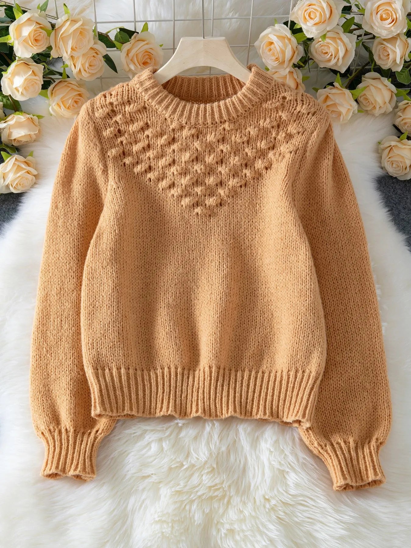 Khaki textured knit round neck long sleeve sweater on hanger with ribbed cuffs