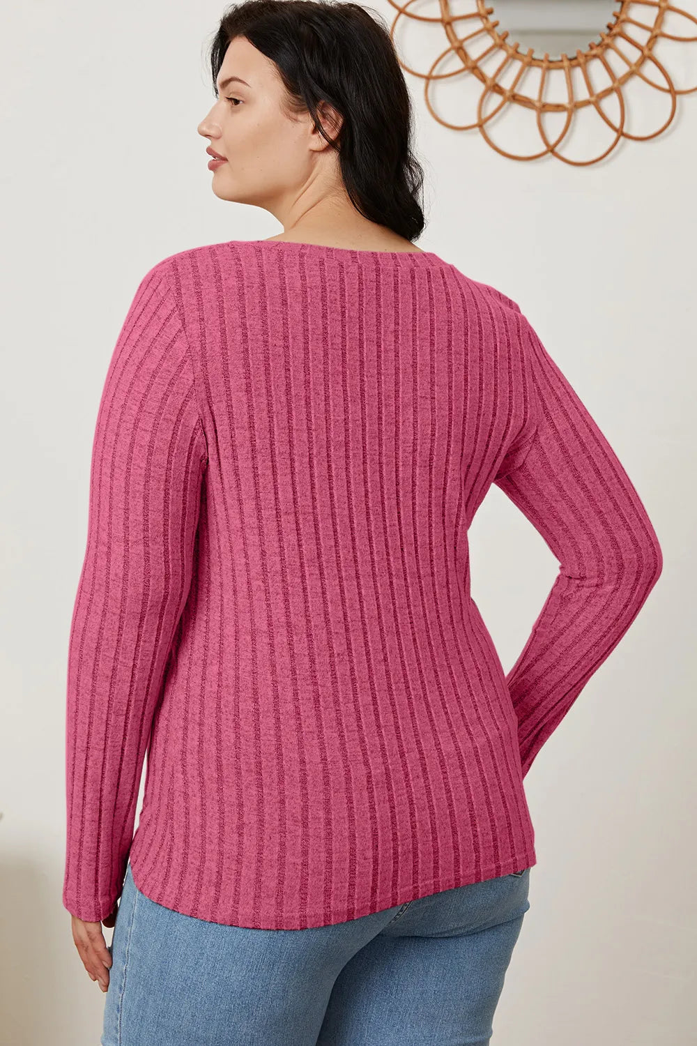 Cedar & Moore pink ribbed knit long-sleeve top, back view on model.