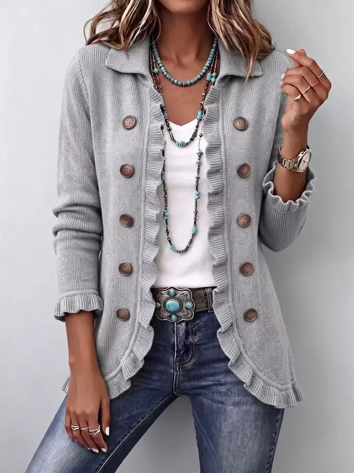 Gray ribbed ruffle button-up cardigan sweater with round front buttons and ruffled front