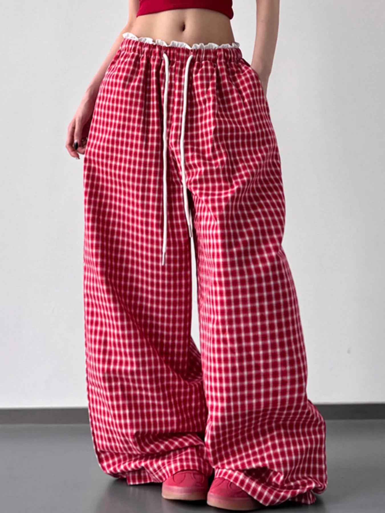 Drawstring plaid wide-leg pants, red with white grid check pattern, roomy wide legs