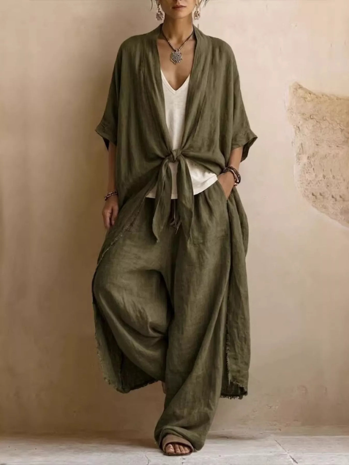 Olive tie-front cardigan and wide-leg pants set with tied waist and flowy drape.