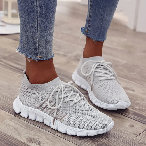 White breathable mesh lace-up athletic sneakers with round toe and thick sole