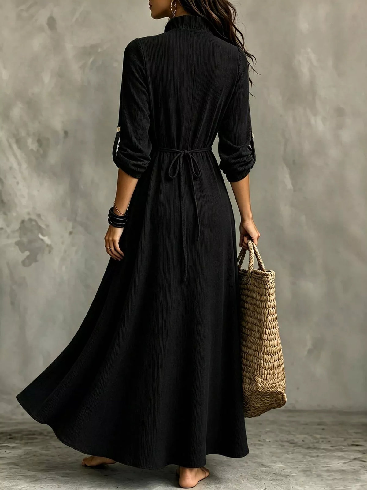Black maxi dress with tie waist on back, 3/4 sleeves and full skirt