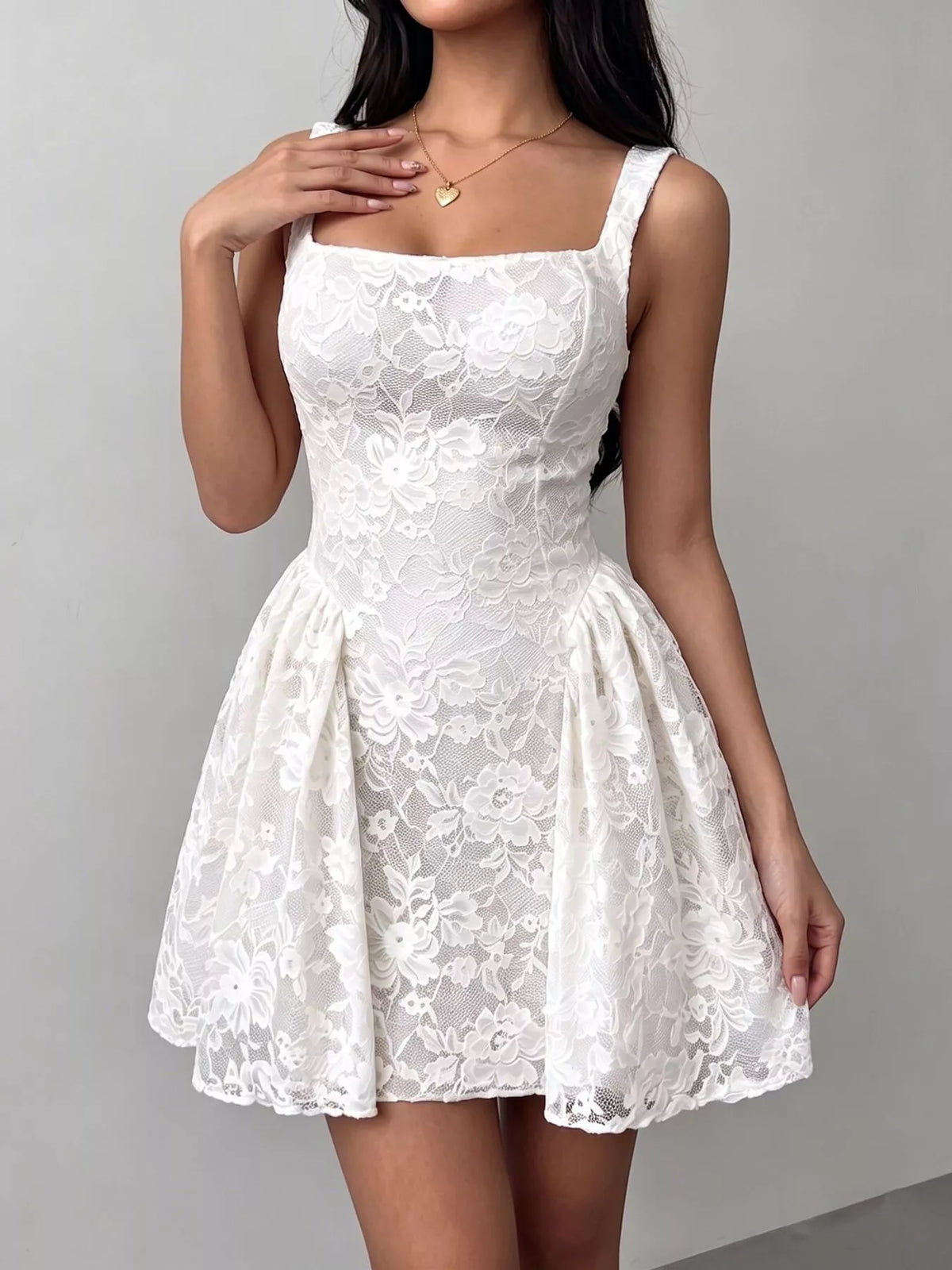 White lace square-neck sleeveless fit-and-flare dress with floral pattern
